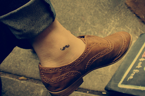 Cute-black-mustache-tattoo-on-the-ankle